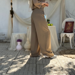 شلوار پارچه ای نس پورش ریزشی  پیله دار  رنگ ارده ای 